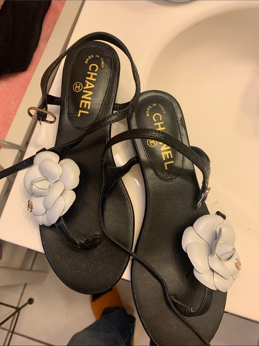 CHANEL Black Leather Sandals with White Camellia Accent